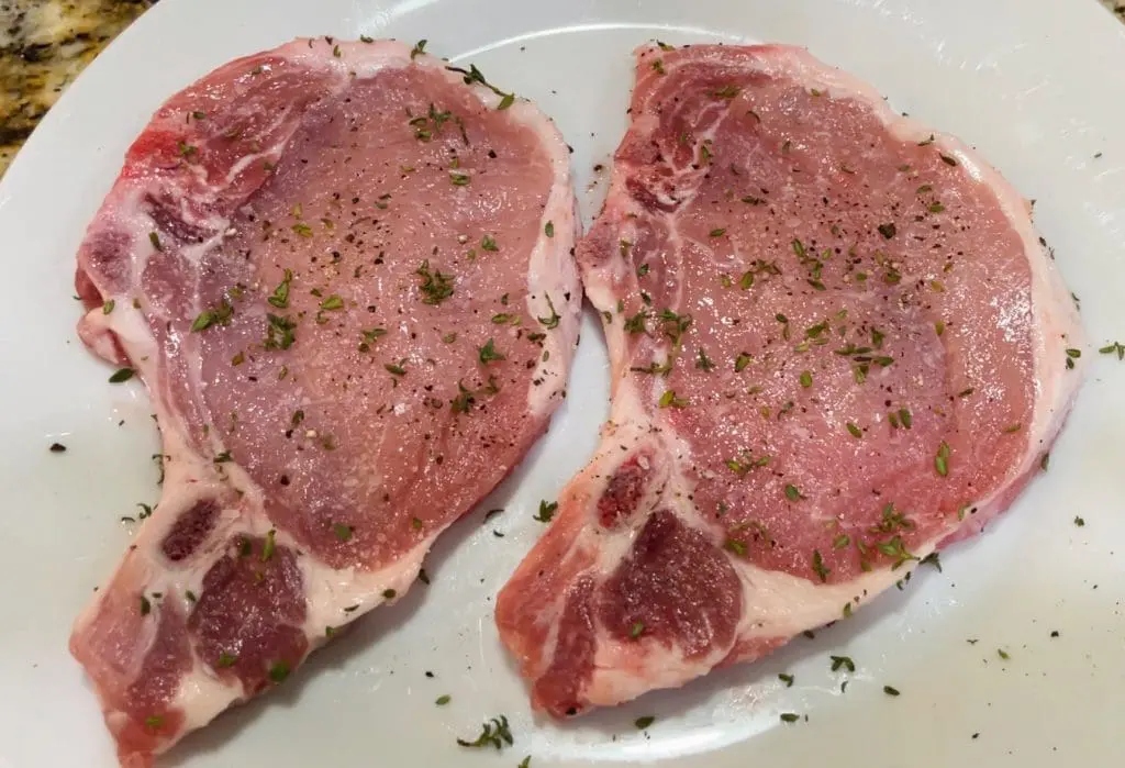 seasoned raw pork chops, substitute the olive oil with Domestic Gourmet Organic Annatto Oil - Aceite de Achiote for richer color and flavor