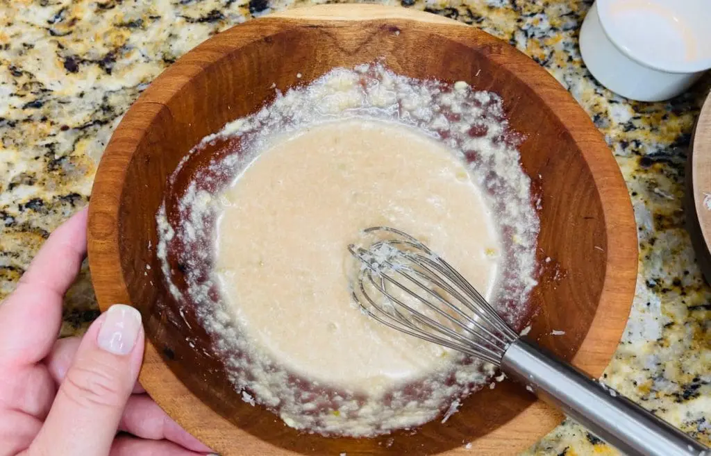 Whisking red wine vinegar and Parmigiano into a vinaigrette, substitute the olive oil with Domestic Gourmet Organic Annatto Oil - Aceite de Achiote for richer color and flavor