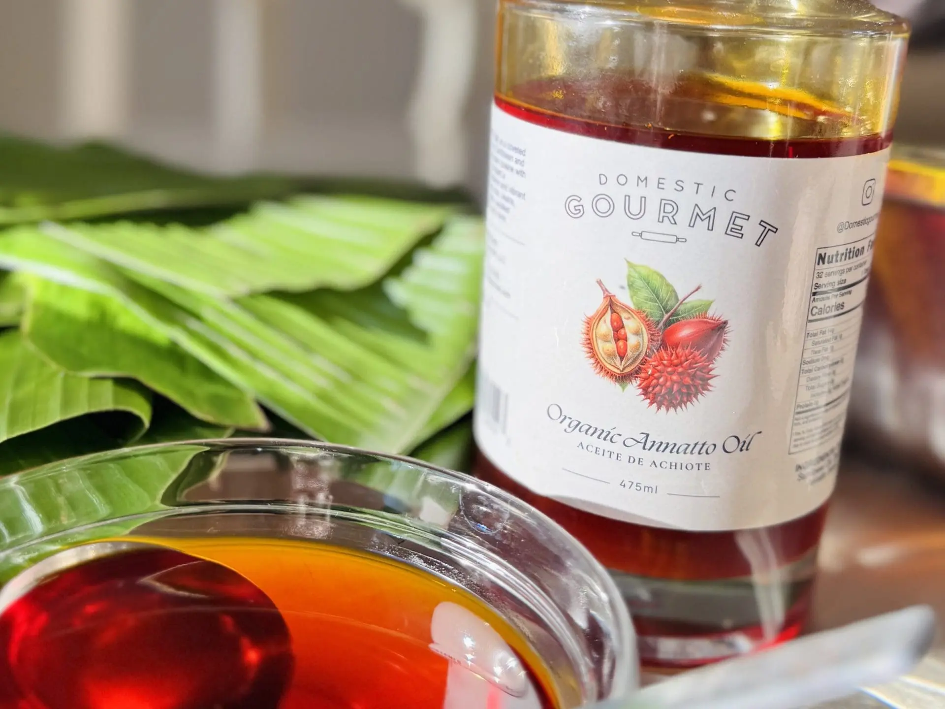 Domestic Gourmet Organic Annatto Oil in its clear bottle
