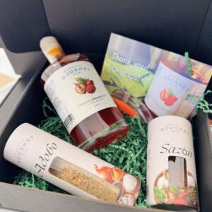 Queen of Noche Buena Gift Box contains Domestic Gourmet Organic Annatto Oil - Aceite de Achiote, Organic Adobo and Organic Sazón