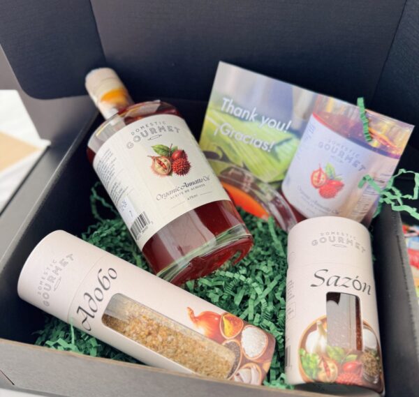Queen of Noche Buena Gift Box contains Domestic Gourmet Organic Annatto Oil - Aceite de Achiote, Organic Adobo and Organic Sazón